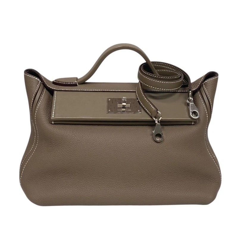 HERMES VAN QUATRE 29 HANDBAG: HERMES Van Quatre 29 Handbag Brand: HERMES Type: Handbag Material: Taurillon Clemence Color: Etop SilverHardware Size: W29cm x H17.5cmx D13cm W11.4 x H6.9x D5.1inch Accessories: None Acces