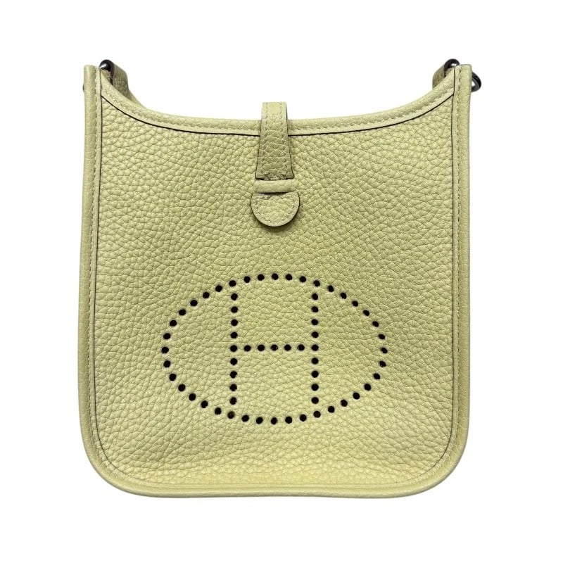 HERMES EVELYN TPM SHOULDER BAG: HERMES Evelyn TPM Shoulder Bag Brand: HERMES Type: Shoulder Bag Material: Taurillon Clemence Color: Jonupussan Size: W17cm x H19cmx D4.5cm W6.7 x H7.5x D1.8inch Accessories: None Accessori