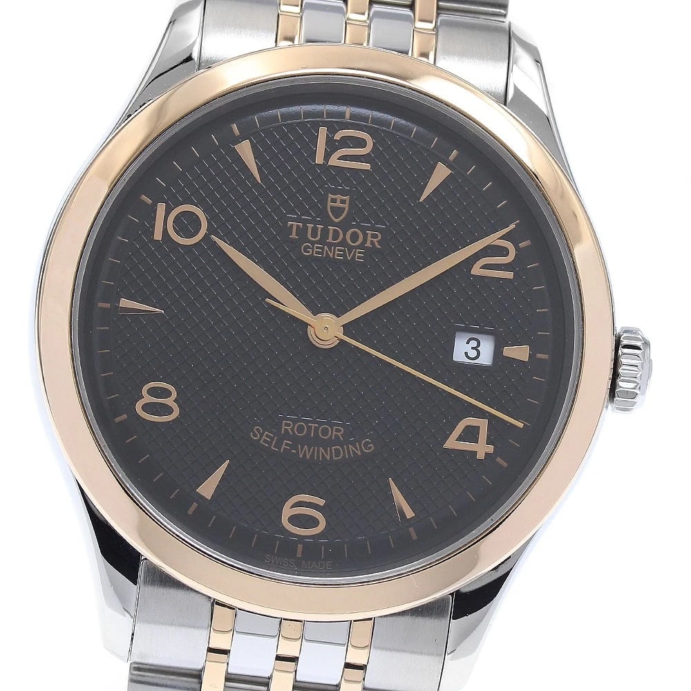 TUDOR DATE BLACK AUTOMATIC WATCH: TUDOR Date black Automatic Watch Brand: TUDOR Type: Wristwatch Material: Band Material Stainless Steel/PG, Case Material Stainless Steel/PG Color: Band Color Silver / Pink Gold, Dial Colorblack, Case 