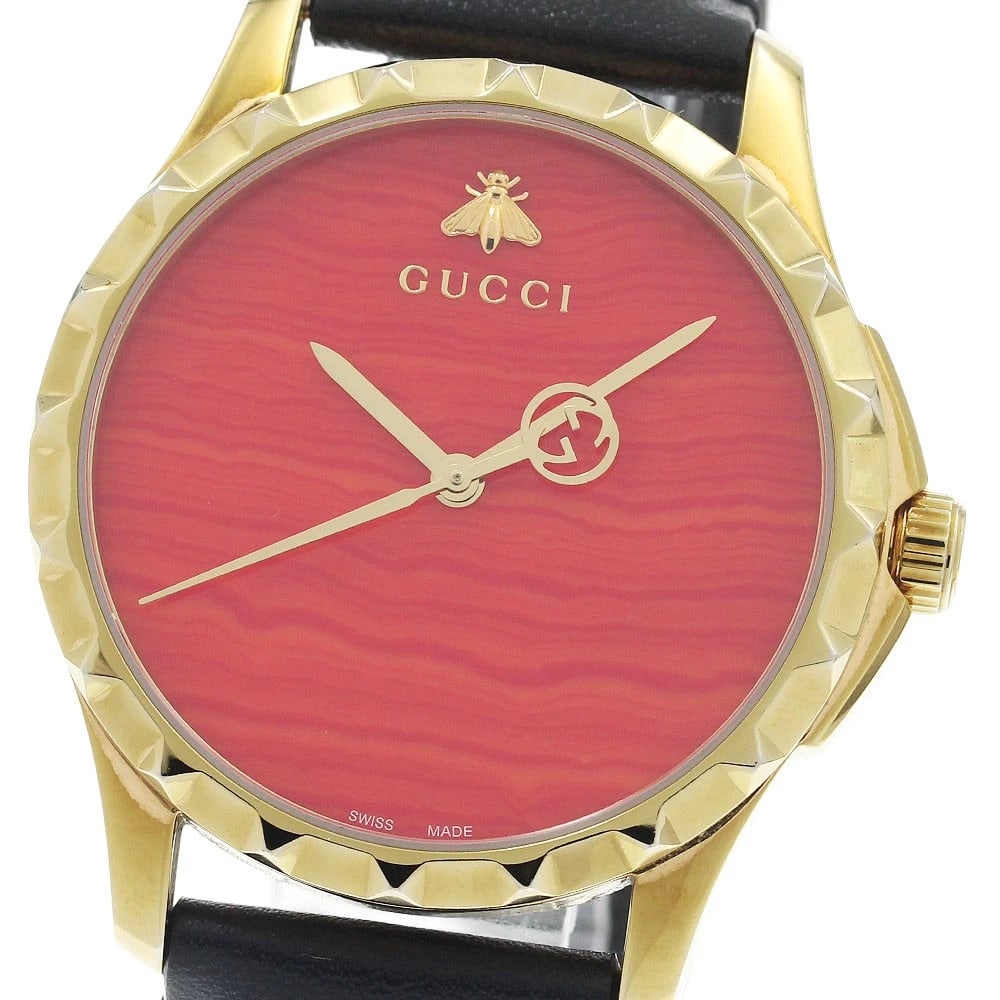 GUCCI TIMELESS RED QUARTZ WATCH: GUCCI timeless Red Quartz Watch Brand: GUCCI Type: Wristwatch Material: Band Material leather, Case Material Stainless Steel/Gold Plated Color: Band Color black, Dial ColorRed, Case ColorGold /