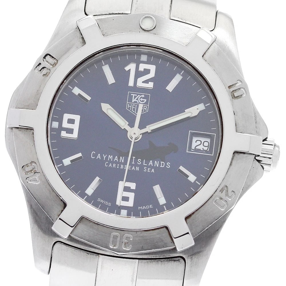 TAG HEUER EXCLUSIVE DATE QUARTZ WATCH: TAG HEUER Exclusive Date Quartz Watch Brand: TAG HEUER Type: Wristwatch Material: Band Material Stainless Steel, Case Material Stainless Steel Color: Band Color Silver, Dial ColorNavy, Case