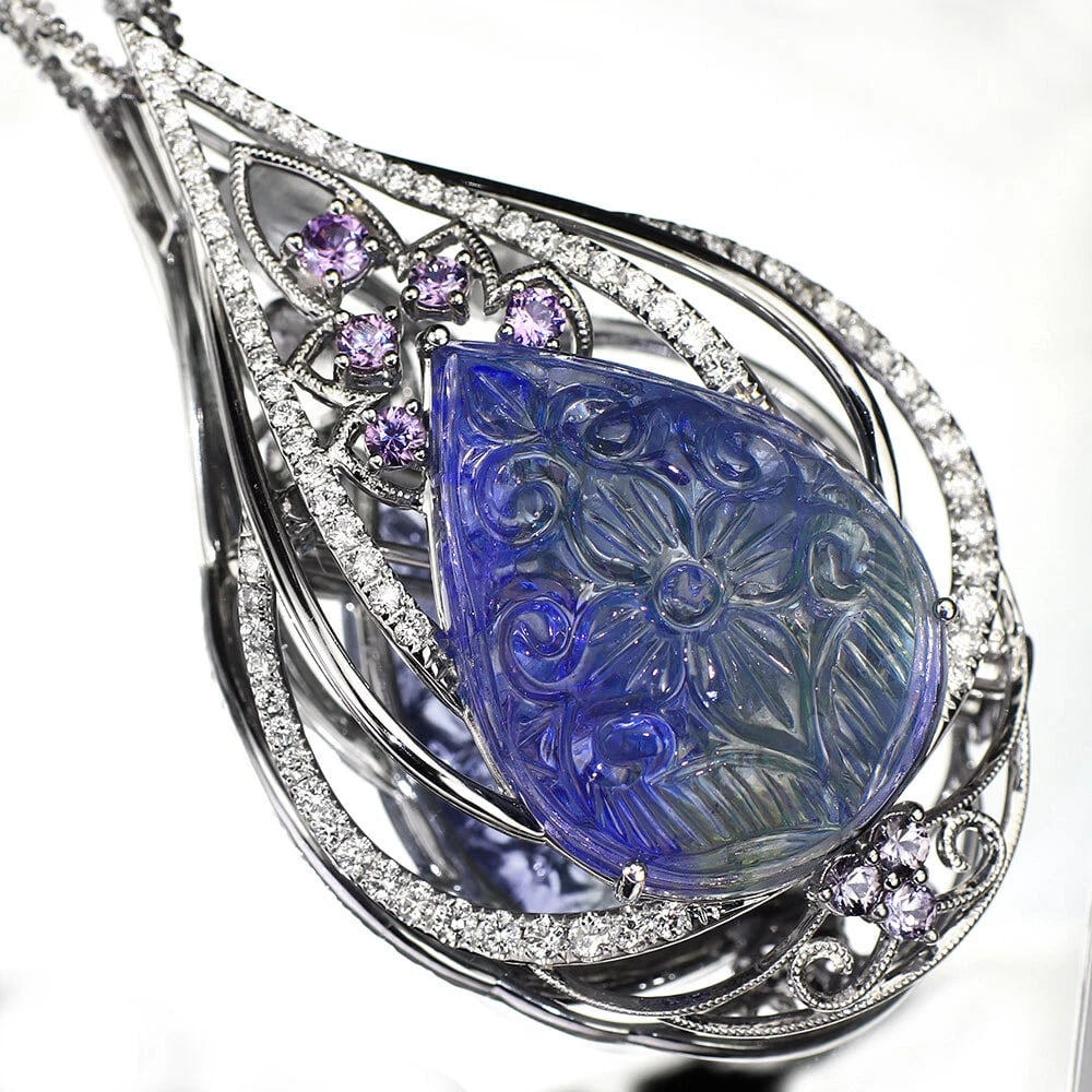 K18WG UNHEATED BICOLOR TANZANITE PURPLE SAPPHIRE DIAMOND NECKLACE: K18WG Unheated Bicolor Tanzanite Purple Sapphire Diamond Necklace Brand: None Type: pendant necklace Material: K18WG, Main Stone/Creation tanzaniteSide Stone sapphire diamond Color: WHITE GOLD Size: