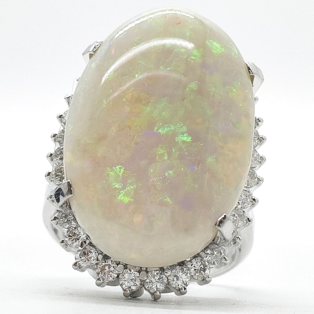 JEWELRY RING OPAL PLATINUM: Jewelry Ring Opal Platinum Brand: Unbranded Type: Ring Material: Pt900, Main Stone/Creation OpalSecondary StoneNatural Diamond Color: Platinum Size: US 5 3/4 Accessories: None Accessories