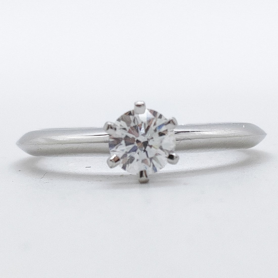 TIFFANY AND CO. RING SOLITAIRE NATURAL DIAMOND PLATINUM: Tiffany and Co. Ring Solitaire Natural Diamond Platinum Brand: Tiffany and Co. Type: Ring Material: Platinum, Color: Platinum Size: US 5 3/4 Accessories: None Accessories Notice: When purc