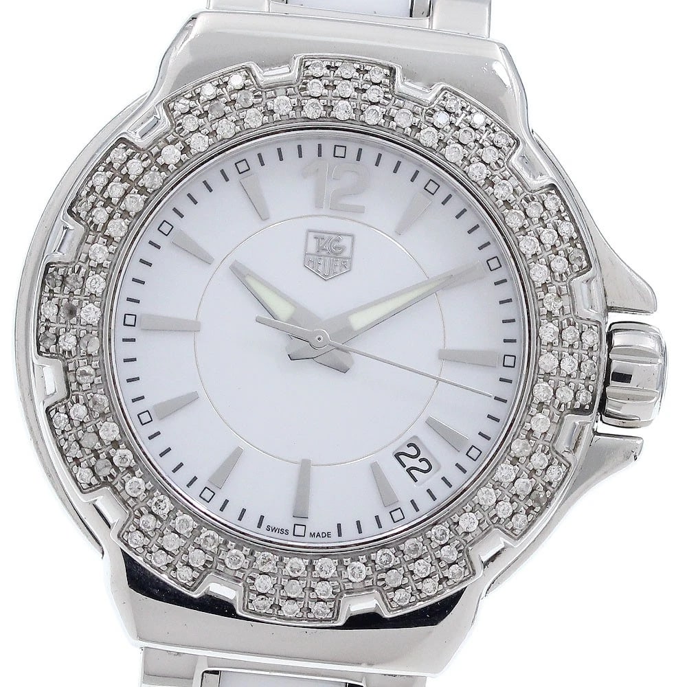 TAG HEUER DIAMOND BEZEL WHITE QUARTZ WATCH: TAG HEUER Diamond Bezel white Quartz Watch Brand: TAG HEUER Type: Wristwatch Material: Band Material Stainless Steel / ceramic, Case Material Stainless Steel Color: Band Color White / Silver, Dial
