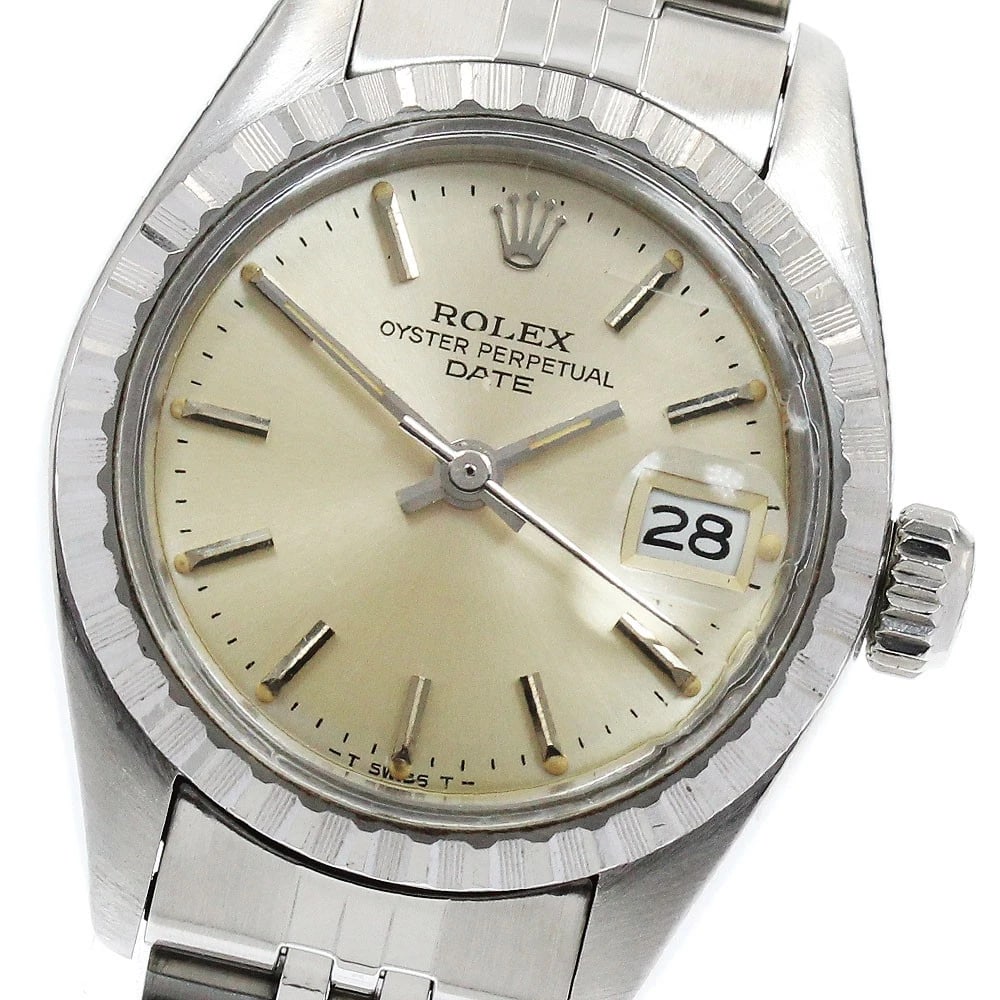 ROLEX OYSTER PERPETUAL DATE SILVER AUTOMATIC WATCH: ROLEX Oyster Perpetual Date Silver Automatic Watch Brand: ROLEX Type: Wristwatch Material: Band Material Stainless Steel, Case Material Stainless Steel Color: Band Color Silver, Dial Color Silver,