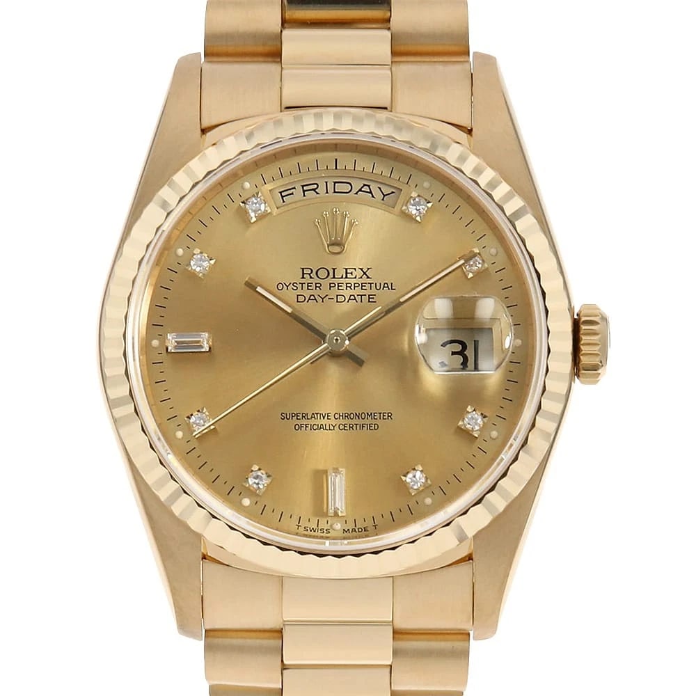 ROLEX DAY DATE DIAMOND BAGUETTE DIAMOND CHAMPAGNE WATCH: ROLEX Day Date Diamond Baguette Diamond Champagne Watch Brand: ROLEX Type: Wrist watch Material: Band Material Yellow Gold, Case Material Yellow Gold Color: Dial Color Champagne Gold Size: Case:W36mm