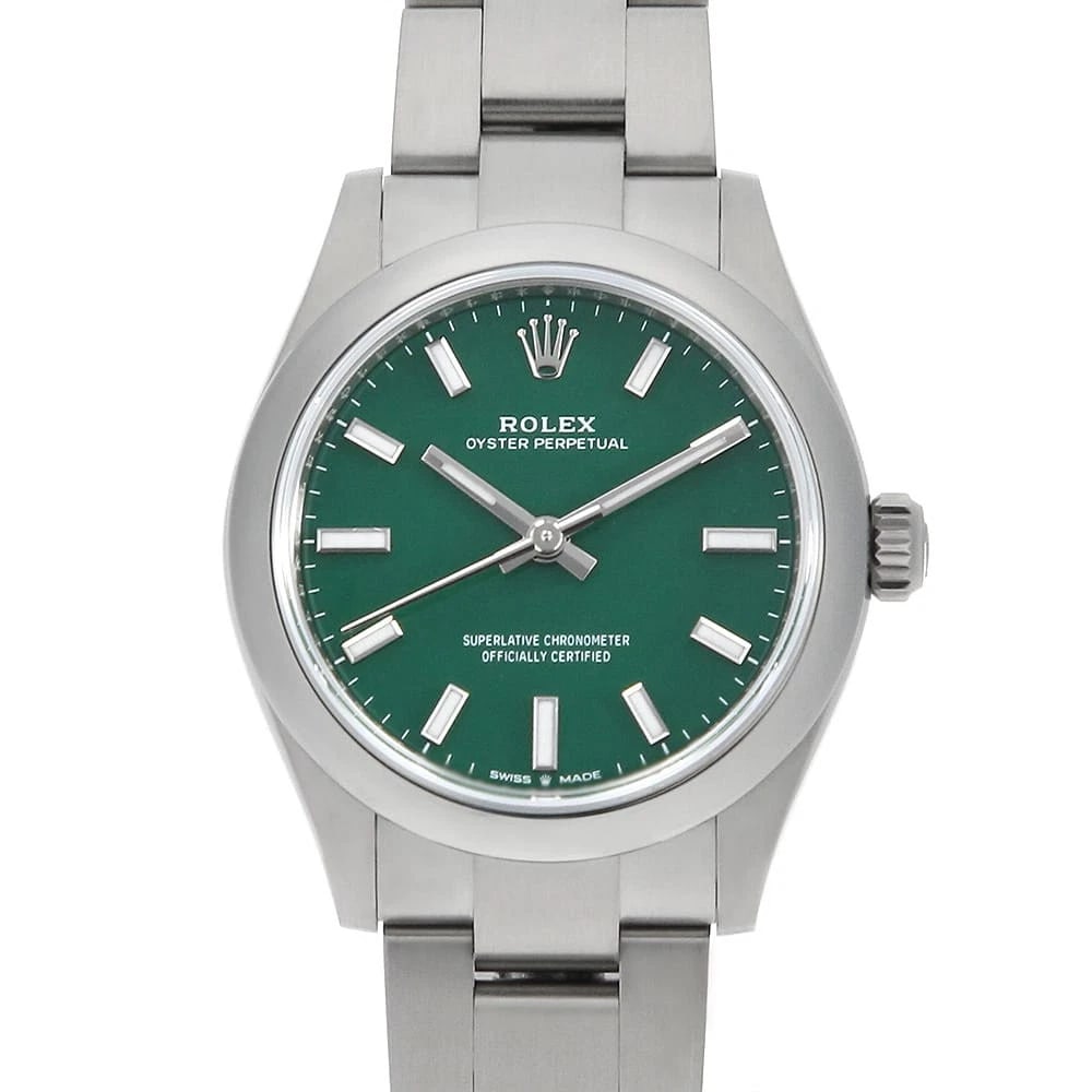 ROLEX OYSTER PERPETUAL GREEN WATCH: ROLEX Oyster Perpetual green Watch Brand: ROLEX Type: Wrist watch Material: Band Material Stainless Steel, Case Material Stainless Steel Color: Dial Color Green Size: Case:W31mm Circumference of