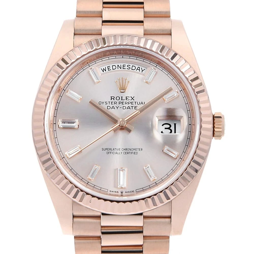 ROLEX DAY DATE BAGUETTE DIAMOND SUNDUST WATCH: ROLEX Day Date Baguette Diamond Sundust Watch Brand: ROLEX Type: Wrist watch Material: Band Material Everose Gold, Case Material Everose Gold Color: Dial Color Sundust Size: Case:W40mm Circumference o