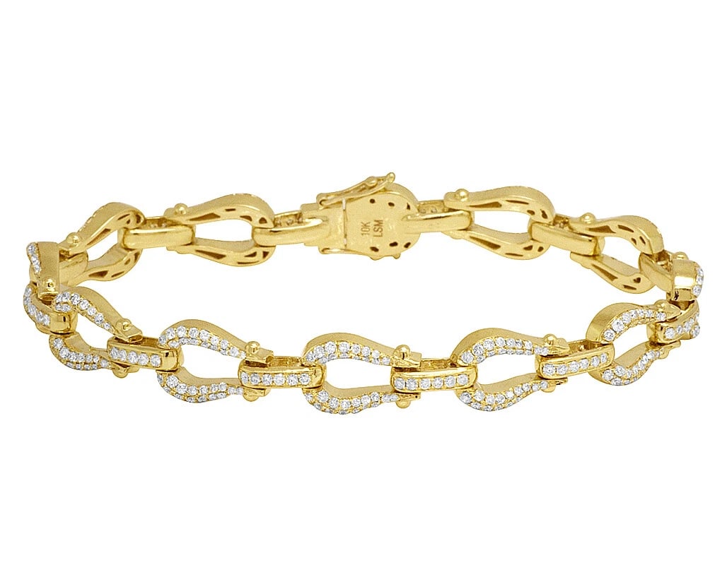 HORSESHOE LINK DIAMOND BRACELET: Horseshoe Link Diamond Bracelet Brand: None Type/Style: Bracelet Material: 10k Yellow Gold Color: Yellow Gold Size: Dimension 10mm Width 8.5" Length Accessories: None Accessories Notice: When