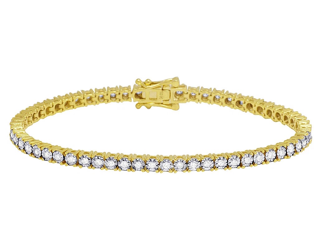 ILLUSION DIAMOND TENNIS BRACELET: Illusion Diamond Tennis Bracelet Brand: None Type/Style: Bracelet Material: 10k Yellow Gold Color: Yellow Gold Size: Dimension 4MM 8" Accessories: None Accessories Notice: When purchasing pre-owned