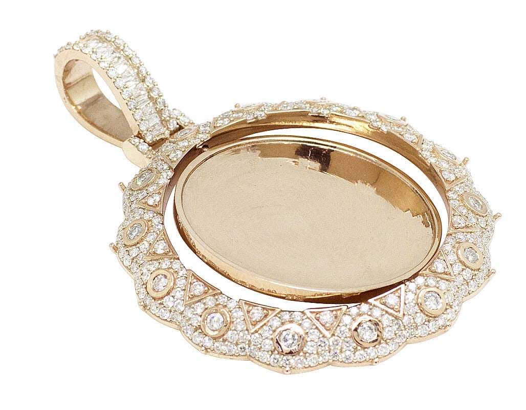 10K GOLD DIAMOND SWIVEL MEMORY PENDANT: 10K Gold Diamond Swivel Memory Pendant Brand: None Type/Style: Pendant Material: 10K Gold, Main Stone/Creation Natural Color: Gold Size: Dimension 2" Accessories: None Accessories Notice: