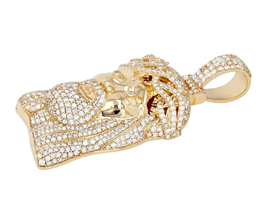 CROWNED JESUS HEAD DIAMOND PENDANT 10K GOLD: Crowned Jesus Head Diamond Pendant 10K Gold Brand: None Type/Style: Pendant Material: 10K Gold, Main Stone/Creation Natural Color: Gold Size: Dimension L 2" W 1" Accessories: None Accessor