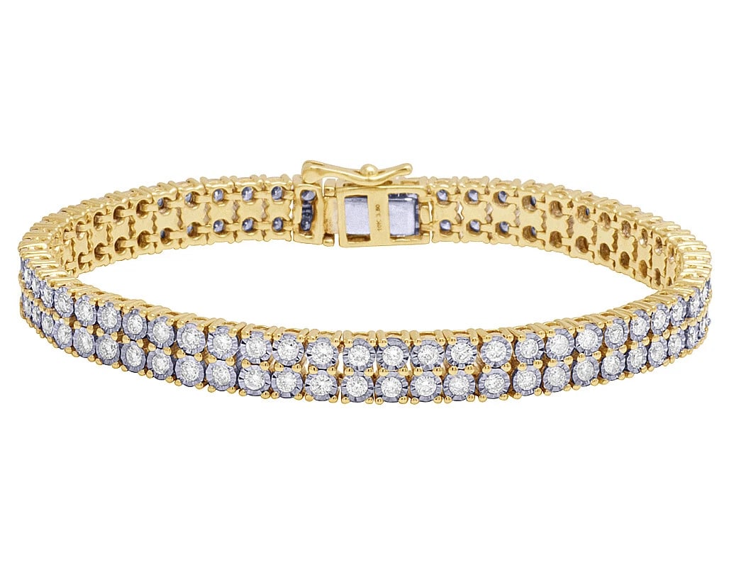 DIAMOND TWO ROW TENNIS MIRACLE BRACELET: Diamond Two Row Tennis Miracle Bracelet Brand: None Type/Style: Bracelet Material: 10K Yellow Gold, Main Stone/Creation Natural Color: Yellow Gold Size: Dimension 7mm, 7" Accessories: None