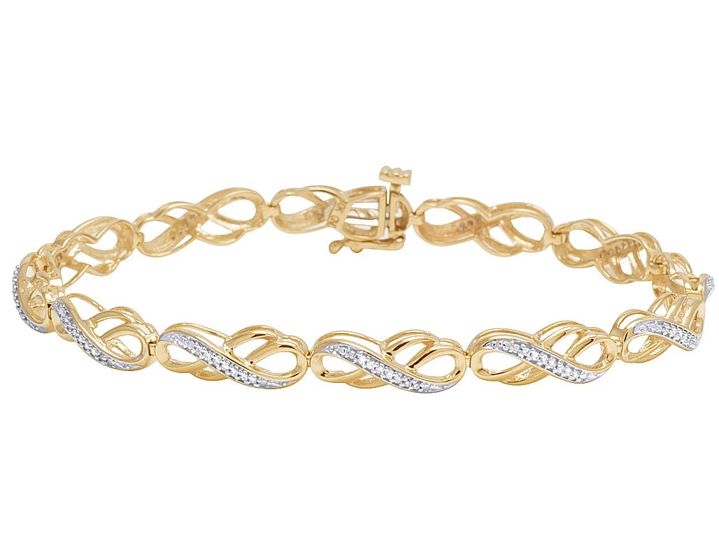10K YELLOW GOLD GENUINE DIAMOND INFINITY DESIGNER BRACELET: 10K Yellow Gold Genuine Diamond Infinity Designer Bracelet Brand: None Type/Style: Bracelet Material: 10K Yellow Gold, Main Stone/Creation Natural Color: YELLOW GOLD Size: Dimension 5mm Accessories: