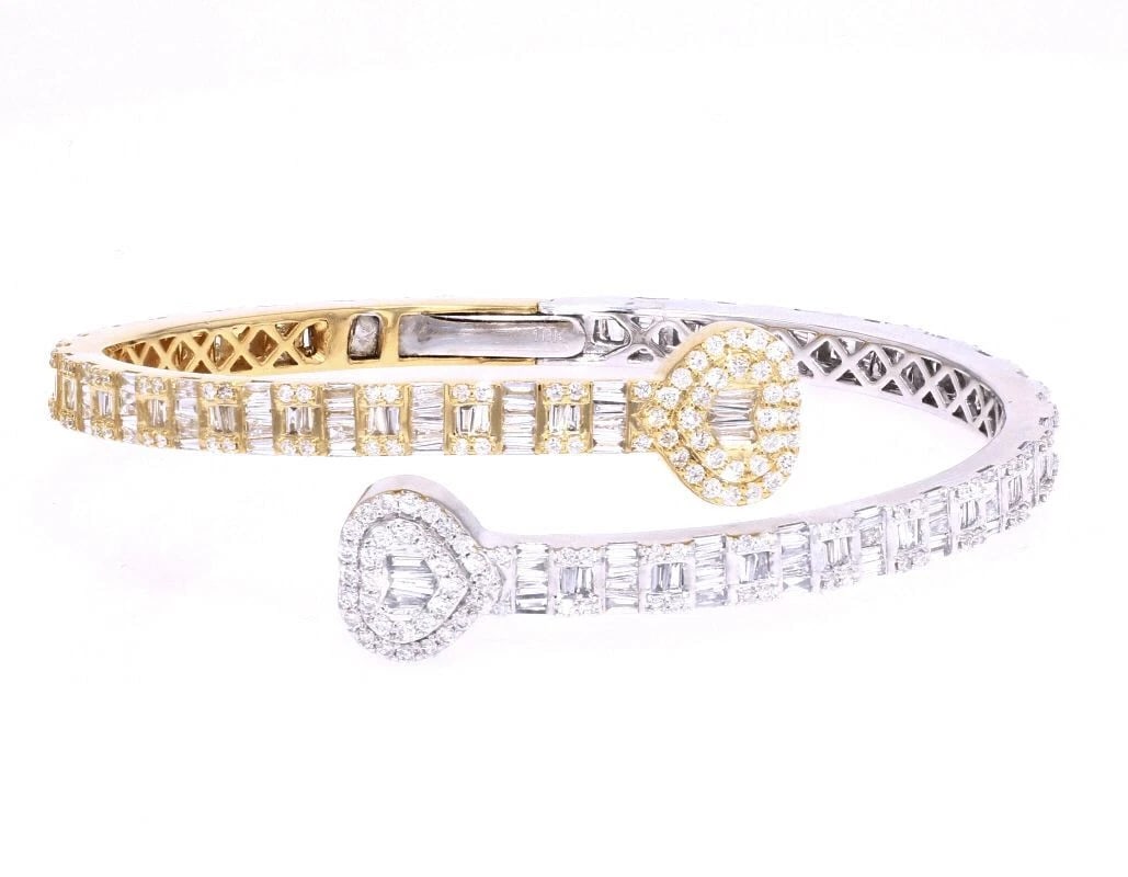 HEART BAGUETTE DIAMOND BRACELET GOLD: Heart Baguette Diamond Bracelet Gold Brand: None Type/Style: Bracelet Material: 10k Yellow-White Gold, Main Stone/Creation Natural Color: Yellow-White Gold Size: Dimension W 5mm x L 7" Accessorie