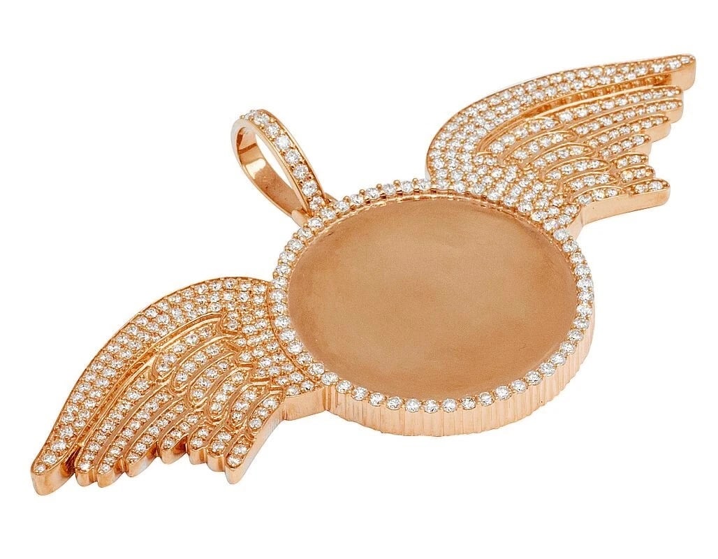 CIRCLE FRAME DIAMOND PHOTO ENGRAVE WING MEMORY PENDANT: Circle Frame Diamond Photo Engrave Wing Memory Pendant Brand: None Type/Style: Pendant Material: 10K Rose Gold, Main Stone/Creation Natural Color: Rose Gold Size: Dimension 2.2" x 3.95" Accessories