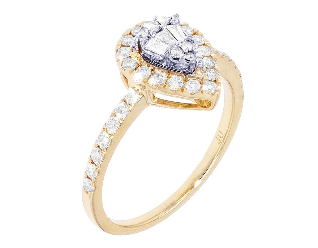PEAR SHAPED BAGUETTE DIAMOND RING: Pear Shaped Baguette Diamond Ring Brand: None Type/Style: Ring Material: 14K Yellow-White Gold, Main Stone/Creation Natural Color: Yellow-White Gold Size: 7US Accessories: None Accessories