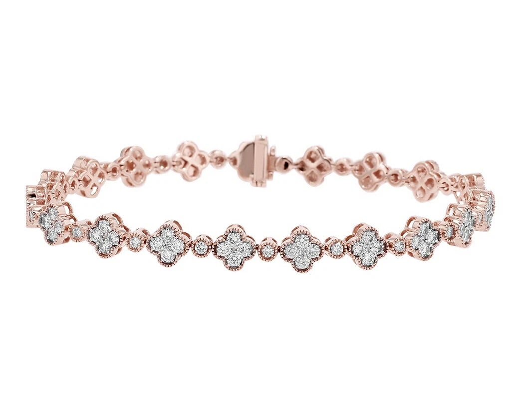 LEAF CLOVER DIAMOND BRACELET 10K ROSE-WHITE GOLD: Leaf Clover Diamond Bracelet 10K Rose-White Gold Brand: None Type/Style: Bracelet Material: 10kMulti-Tone Gold, Main Stone/Creation Natural Color: Multi-Tone Gold Size: Dimension 7MM 7.5" Accessor