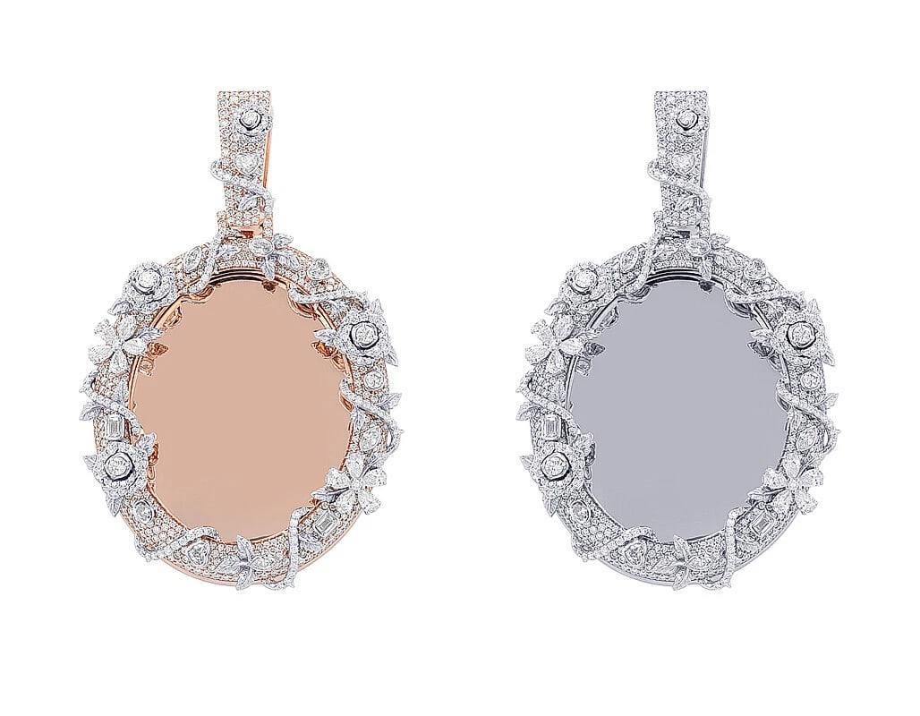PEAR-MARQUISE DIAMOND EXTERNAL BLOSSOM OVAL MEMORY PENDANT: Pear-Marquise Diamond External Blossom Oval Memory Pendant Brand: None Type/Style: Pendant Material: 10kMulti-Tone Gold, Main Stone/Creation Natural Color: Multi-Tone Gold Size: Dimension L 3" , W 1.9
