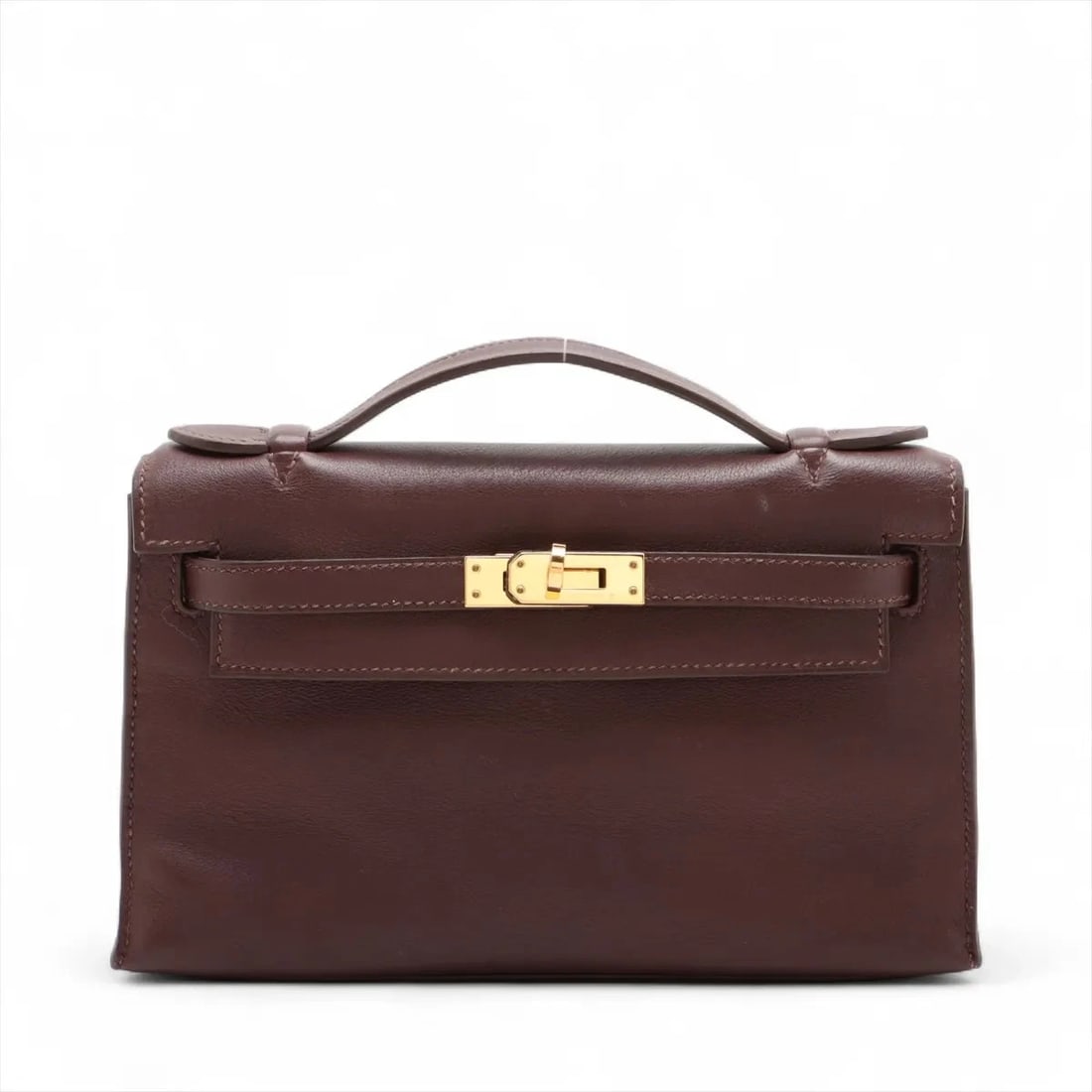 HERMES POCHETTE KELLY MINI VEAU SWIFT BROWN GOLD METAL FITTINGS HANDBAG: Hermes Pochette Kelly Mini Veau Swift Brown Gold Metal Fittings Handbag Brand: Hermès Type/Style: Hand bag Material: Veau Swift Color: Brown Size: Height:4.7inch Length:8.5inch Depth:2.8inch Handle h