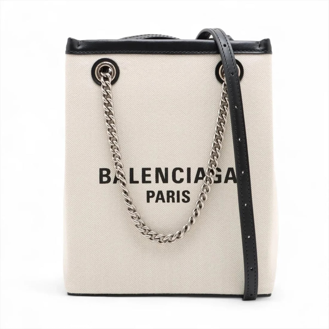 BALENCIAGA DUTY FREE CANVAS X LEATHER 2 WAY HANDBAG HANDBAG: Balenciaga duty free canvas x leather 2 Way Handbag Handbag Brand: Balenciaga Type/Style: Hand bag Material: Canvas & Leather Color: Beige x black Size: Height:8.1inch Length:6.5inch Depth:2.6inch Han