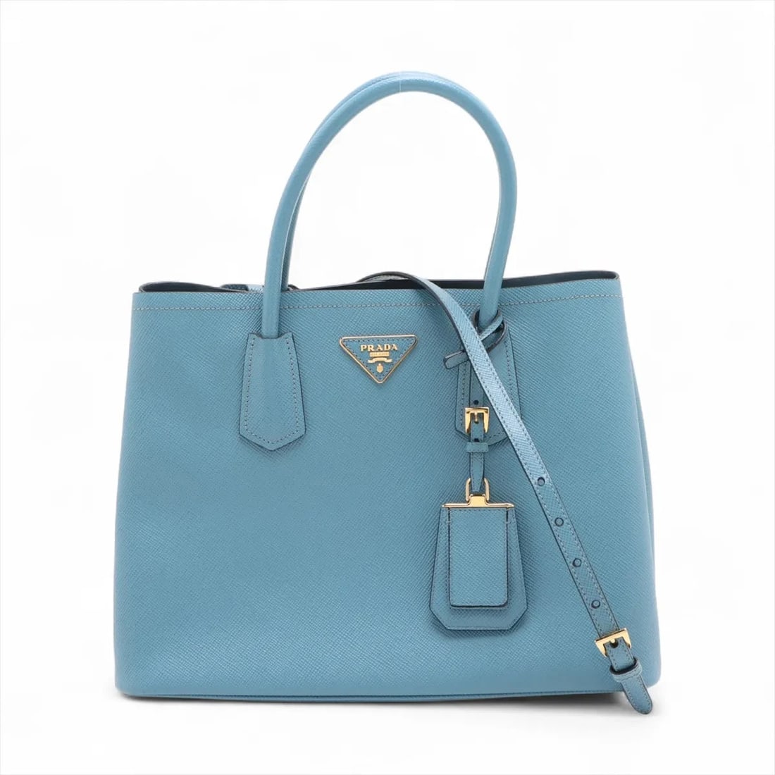 PRADA SAFFIANO CUIR LEATHER 2 WAY HANDBAG: Prada Saffiano Cuir Leather 2 Way Handbag Brand: Prada Type/Style: Hand bag Material: Leather Color: Blue Size: Height:9.8inch Length:13.2inch Depth:5.7inch Handle height:4.9inch Accessories: None