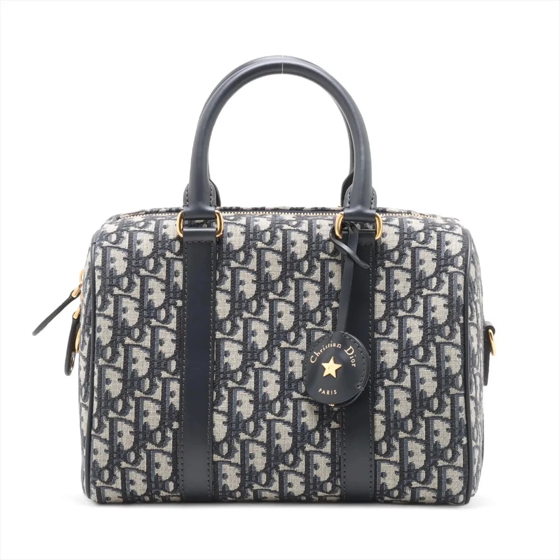 CHRISTIAN DIOR OBLIQUE GROOVE 25 CANVAS X LEATHER HANDBAG HANDBAG: Christian Dior Oblique Groove 25 canvas x leather Handbag Handbag Brand: Christian Dior Type/Style: Hand bag Material: Canvas & Leather Color: Navy Blue Size: Height:7.3inch Length:10.0inch Depth:6.1i