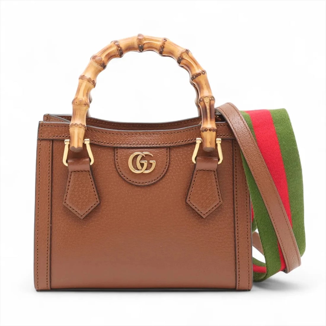 GUCCI BAMBOO DIANA LEATHER 2 WAY HANDBAG HANDBAG: Gucci Bamboo Diana Leather 2 Way Handbag Handbag Brand: Gucci Type/Style: Hand bag Material: Leather Color: Brown Size: Height:6.3inch Length:7.9inch Depth:3.7inch Handle height:3.0inch Accessorie