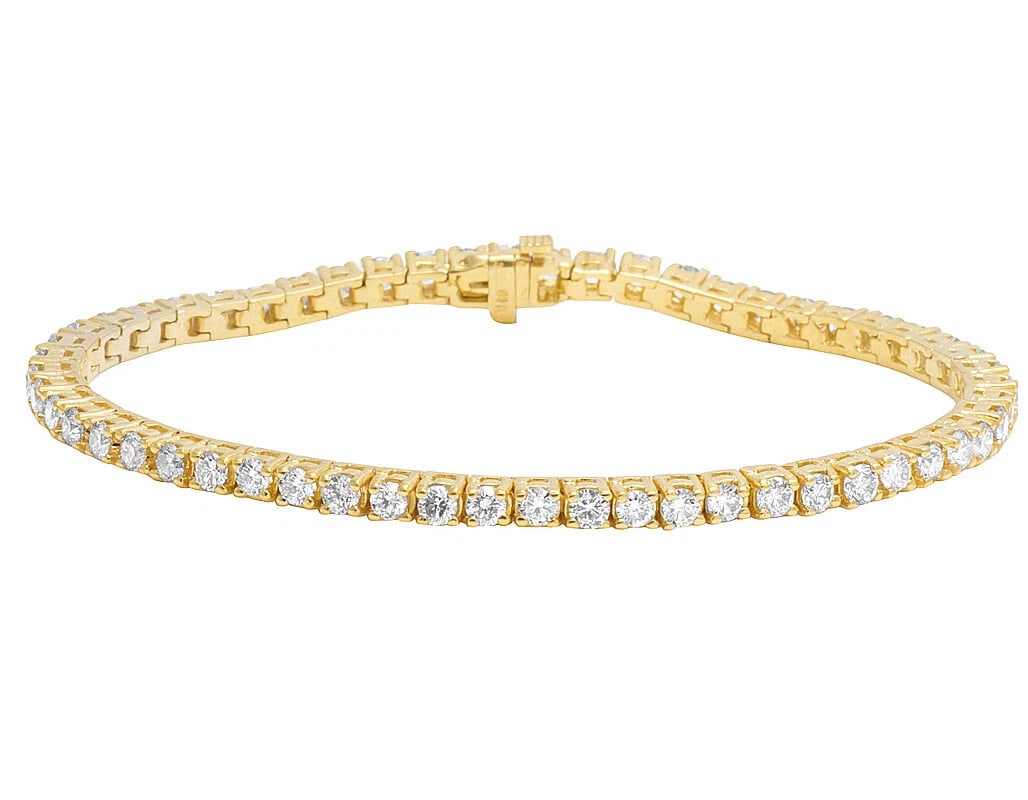 SOLITAIRE 1 ROW TENNIS DIAMOND BRACELET: Solitaire 1 Row Tennis Diamond Bracelet Brand: None Type/Style: Bracelet Material: 10K Yellow Gold, Main Stone/Creation Natural Color: Yellow Gold Size: Item Length 8 in.,Width 3mm Accessories: None