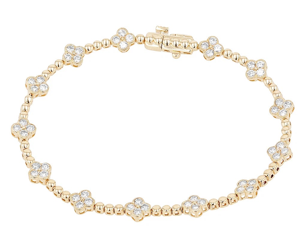 BEZEL-SET DIAMOND CLOVER LEAF BRACELE: Bezel-Set Diamond Clover Leaf Bracele Brand: None Type/Style: Bracelet Material: 14K Yellow Gold, Main Stone/Creation Natural Color: Yellow Gold Size: Dimension L 7" , W 6mm Width 6.0mm Length 7 in.