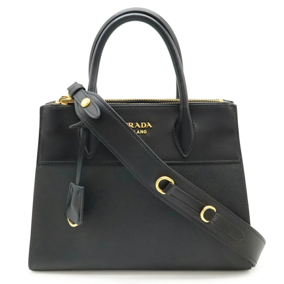 PRADA PARADIGM HANDBAG/SHOULDER BAG: PRADA Paradigm Handbag/Shoulder Bag Brand: Prada Type/Style: Handbag, Shoulder bag Material: Leather Color: Black, Nero Size: (HxWxD) 21cm x 27.5cm x 13cm / 8.26'' x 10.82'' x 5.11'' Accessories: