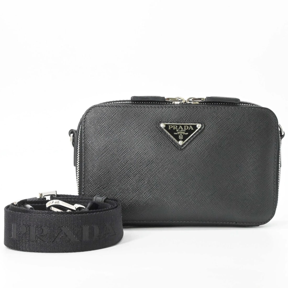 PRADA BRICK SAFFIANO LEATHER SHOULDER BAG: PRADA Brick Saffiano Leather Shoulder Bag Brand: Prada Type/Style: Shoulder bag Material: Saffiano triangle Color: Black Size: (HxWxD) 11cm x 18.5cm x 4cm / 4.33'' x 7.28'' x 1.57'' Accessories: N