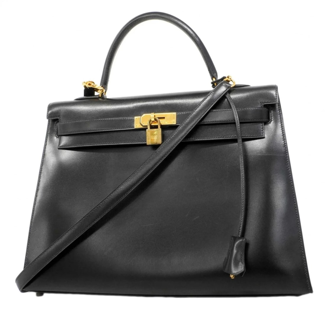 HERMES KELLY 35 HANDBAG, BOX CALF LEATHER, BLACK: Hermes Kelly 35 Handbag, Box Calf Leather, Black Brand: Hermes Type/Style: Handbag Material: Box calf leather Color: Black Size: (HxWxD) 27cm x 36cm x 12.5cm / 10.62'' x 14.17'' x 4.92'' Accessories: