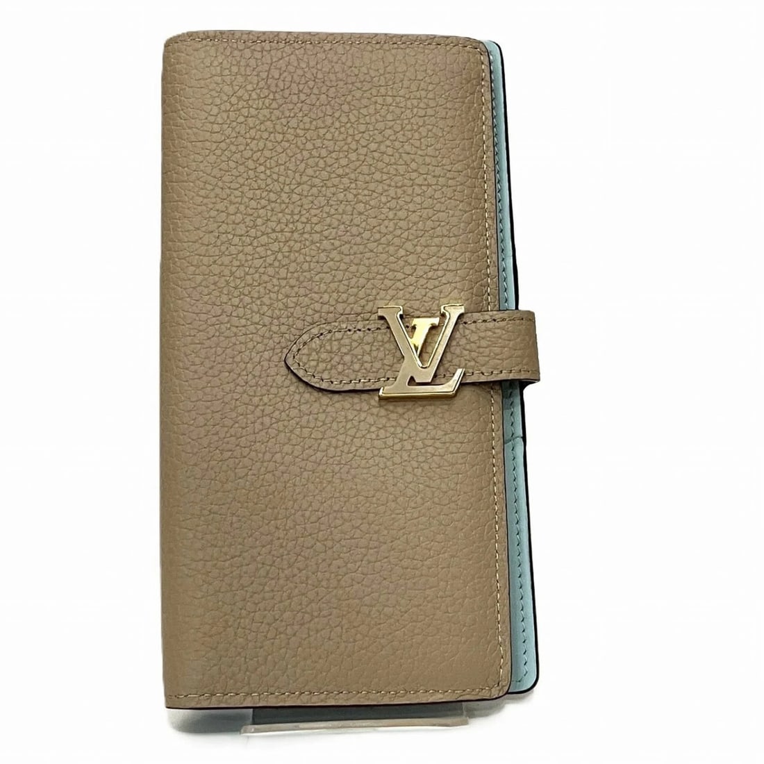 LOUIS VUITTON VERTICAL WALLET, LONG TAURILLON LEATHER: Louis Vuitton Vertical Wallet, Long Taurillon Leather Brand: Louis Vuitton Type/Style: Type Long wallet (bi-fold) Material: Leather Color: Beige Size: (HxWxD) 19cm x 10cm x 2cm / 7.48'' x 3.93'' x