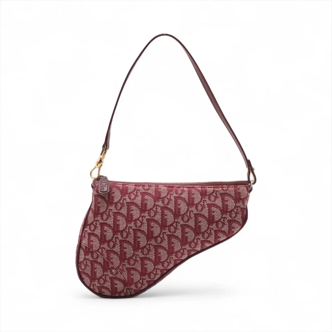 CHRISTIAN DIOR TROTTER SADDLE CANVAS & LEATHER HANDBAG HANDBAG: Christian Dior Trotter Saddle Canvas & Leather Handbag Handbag Brand: Christian Dior Type/Style: Hand bag Material: Canvas & Leather Color: Bordeaux Size: Height:6.1inch Length:7.9inch Depth:1.8inch H