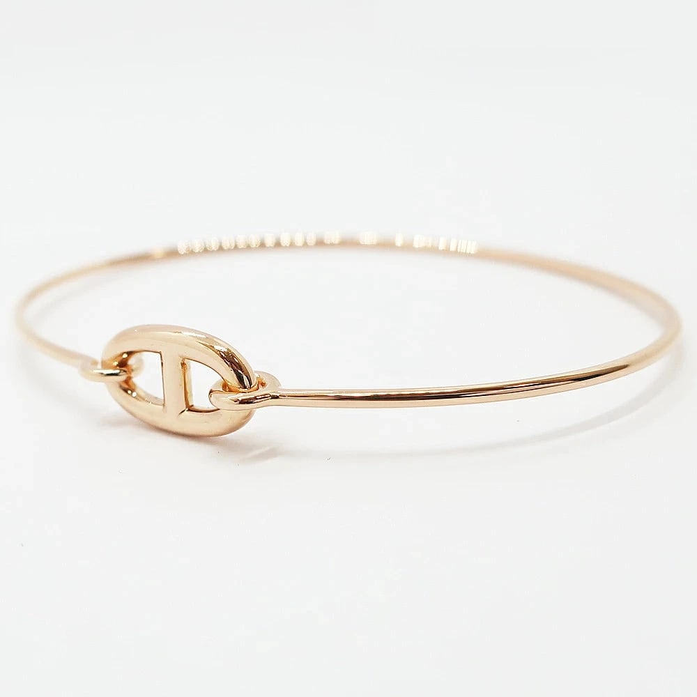HERMES RONDE CHAINE BANGLE BRACELET: HERMES RONDE CHAINE BANGLE BRACELET Brand: Hermes Type/Style: BANGLE BRACELET Material: 18K RG Color: Rose Gold Size: Wrist size: 15.5cm Top: W13mm x H7mm Accessories: None Accessories Not