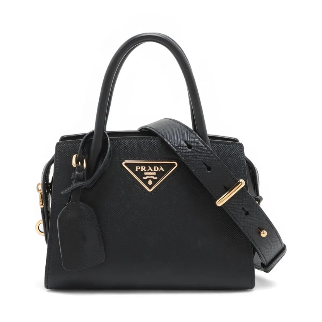 PRADA SAFFIANO LEATHER 2 WAY HANDBAG: Prada Saffiano Leather 2 Way Handbag Brand: Prada Type/Style: Hand bag Material: Leather Color: Black Size: Height:6.3inch Length:8.7inch Depth:4.7inch Handle height:3.9inch Accessories: None