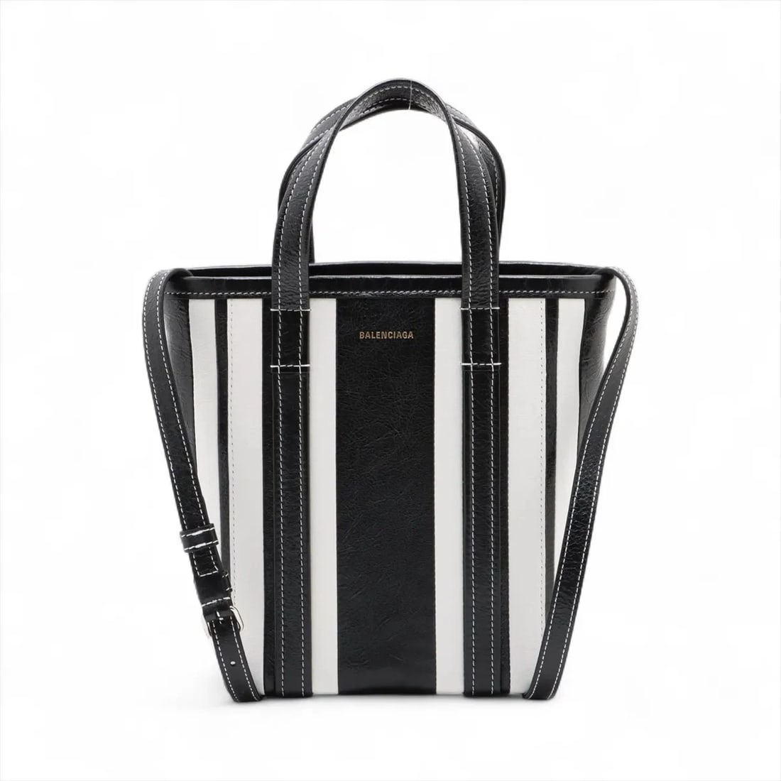 BALENCIAGA LEATHER 2 WAY HANDBAG BLACK X WHITE HANDBAG: Balenciaga Leather 2 Way Handbag black x white Handbag Brand: Balenciaga Type/Style: Hand bag Material: Leather Color: Black × White Size: Height:9.3inch Length:7.1inch Depth:3.9inch Handle height:4.
