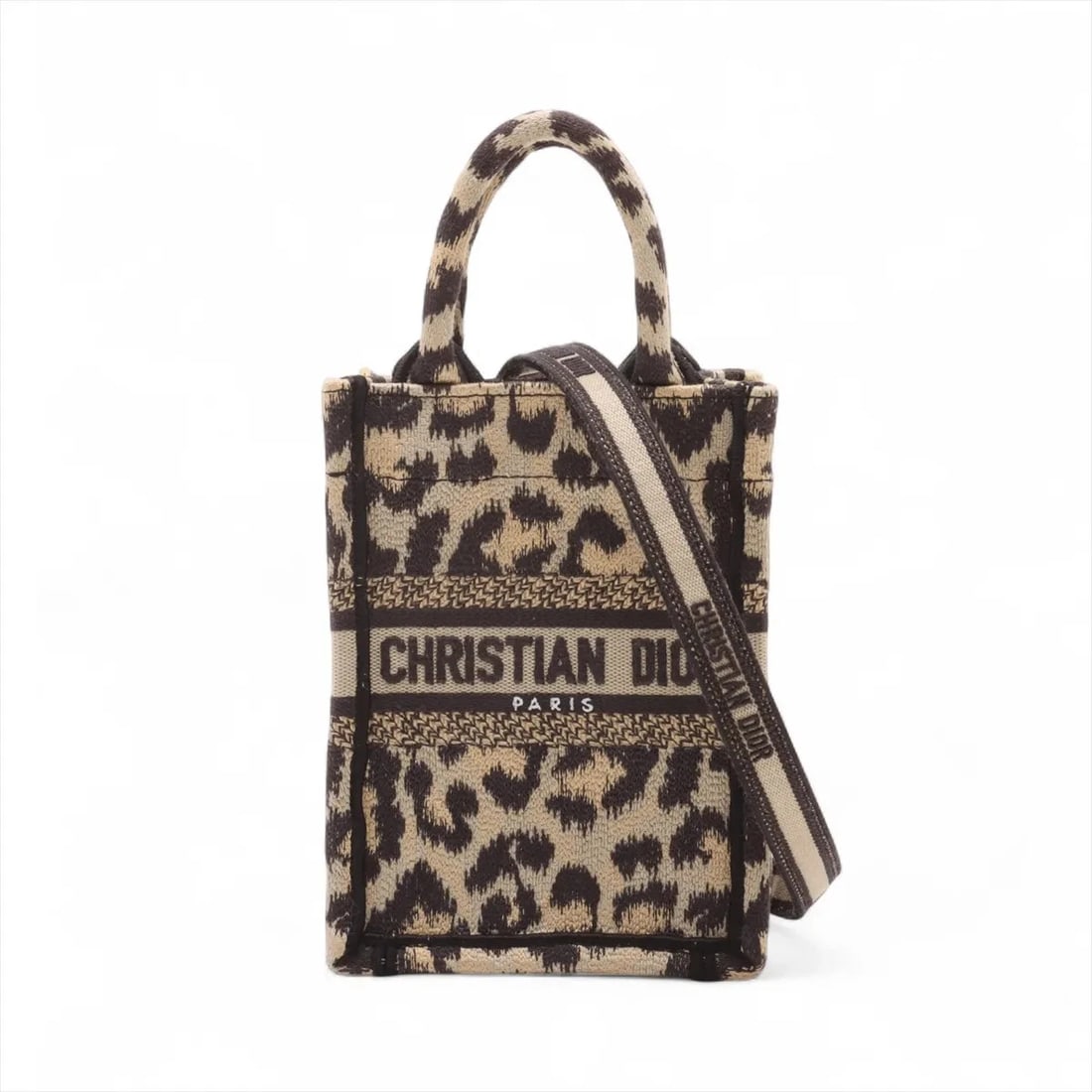 CHRISTIAN DIOR VERTICAL BOOK TOTE CANVAS 2 WAY HANDBAG HANDBAG: Christian Dior Vertical Book Tote canvas 2 Way Handbag Handbag Brand: Christian Dior Type/Style: Hand bag Material: Canvas Color: Léopard Size: Height:7.1inch Length:5.1inch Depth:2.8inch Handle heig