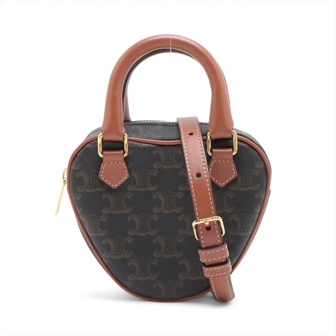CELINE TRIOMPHE HEARTS PVC & LEATHER 2 WAY HANDBAG HANDBAG: Celine Triomphe hearts PVC & leather 2 Way Handbag Handbag Brand: Celine Type/Style: Hand bag Material: PVC & leather Color: Brown Size: Height:5.1inch Length:5.9inch Depth:2.2inch Handle height:2.6in