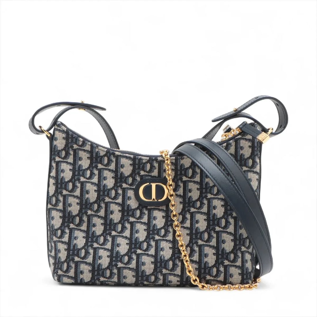 CHRISTIAN DIOR OBLIQUE CANVAS & LEATHER 2 WAY SHOULDER BAG: Christian Dior Oblique Canvas & Leather 2 Way Shoulder bag Brand: Christian Dior Type/Style: Shoulder bag Material: Canvas & Leather Color: Navy Blue Size: Height:6.5inch Length:7.3inch Depth:2.8inch 