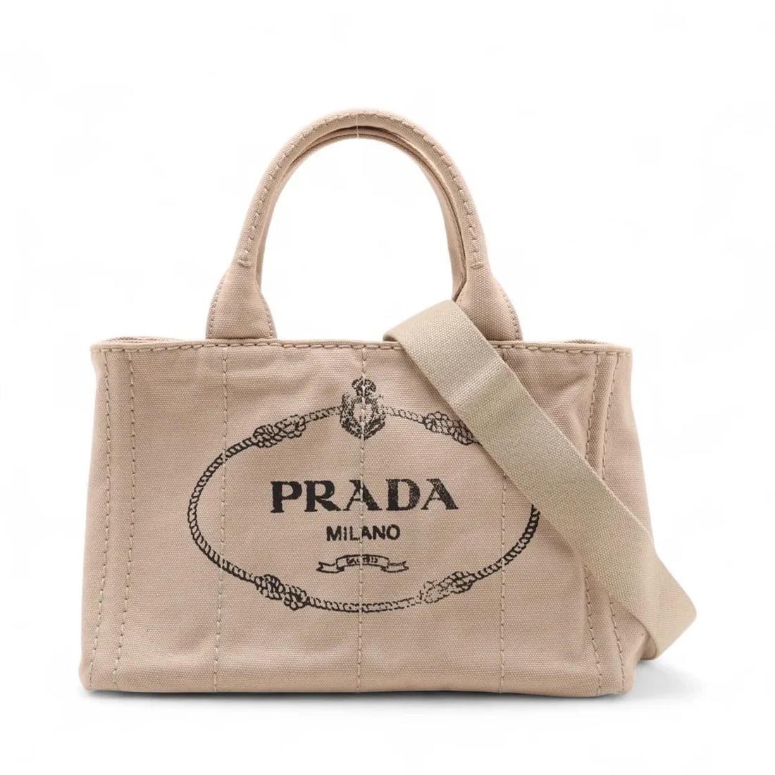 PRADA CANAPA CANVAS 2 WAY HANDBAG: Prada Canapa canvas 2 Way Handbag Brand: Prada Type/Style: Hand bag Material: Canvas Color: Beige Size: Height:7.5inch Length:10.6inch Depth:5.7inch Handle height:4.5inch Accessories: None