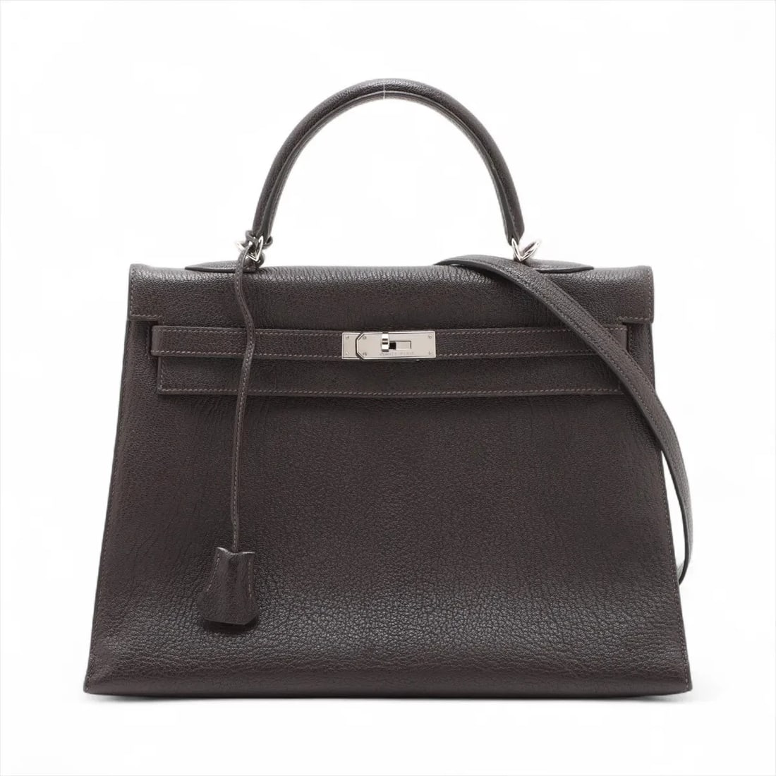 HERMES KELLY 35 SERIE CHEVRE COROMANDEL EBÈNE HANDBAG: Hermes Kelly 35 Serie Chevre Coromandel Ebène Handbag Brand: Hermès Type/Style: Hand bag Material: Chevre Coromandel Color: Ebène Size: Height:9.6inch Length:14.2inch Depth:5.1inch Handle