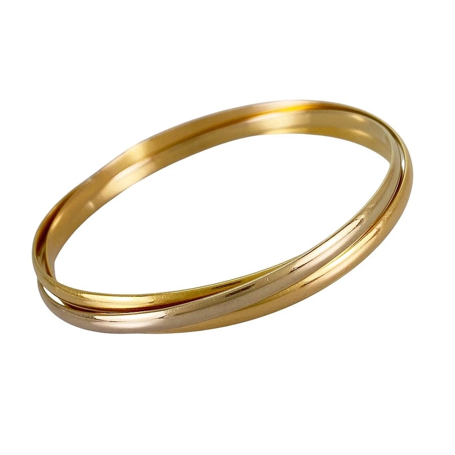CARTIER TRINITY YELLOW GOLD BANGLE: Cartier Trinity Yellow gold Bangle Brand: Cartier Type/Style: Bangle Material: 18K Yellow Gold 18K White Gold 18K Rose Gold Color: Gold Size: Wrist Size:19cm Accessories: None Accessories N