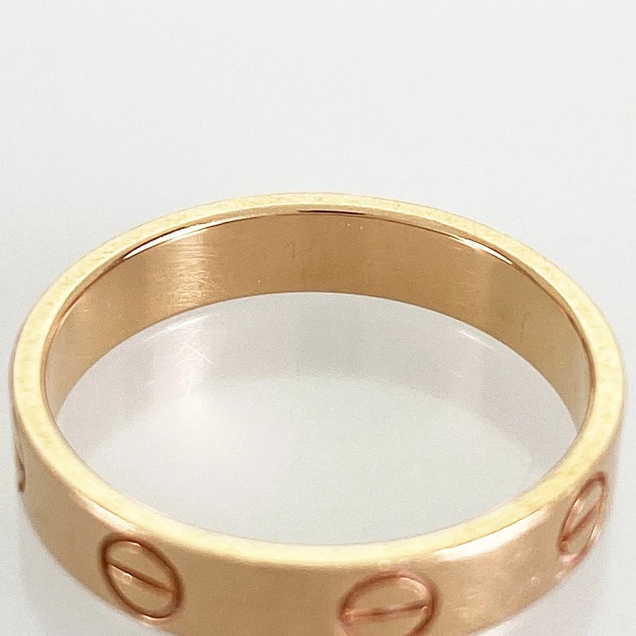 CARTIER MINI LOVE ROSE GOLD RING: Cartier Mini Love Rose gold Ring Brand: Cartier Type/Style: Ring Material: 18K Rose Gold Color: Gold Size: US:5.5 Accessories: None Accessories Notice: When purchasing pre-owned goods, plea