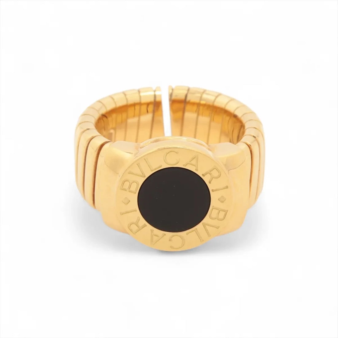 BVLGARI BVLGARI BVLGARI TUBOGAS ONYX RING: Bvlgari Bvlgari Bvlgari Tubogas Onyx Ring Brand: Bvlgari Type/Style: Ring Material: 750(YG) Color: Not Specified Size: 5.5 - 5.75 US Accessories: None Accessories Notice: When purchasing pre-owned