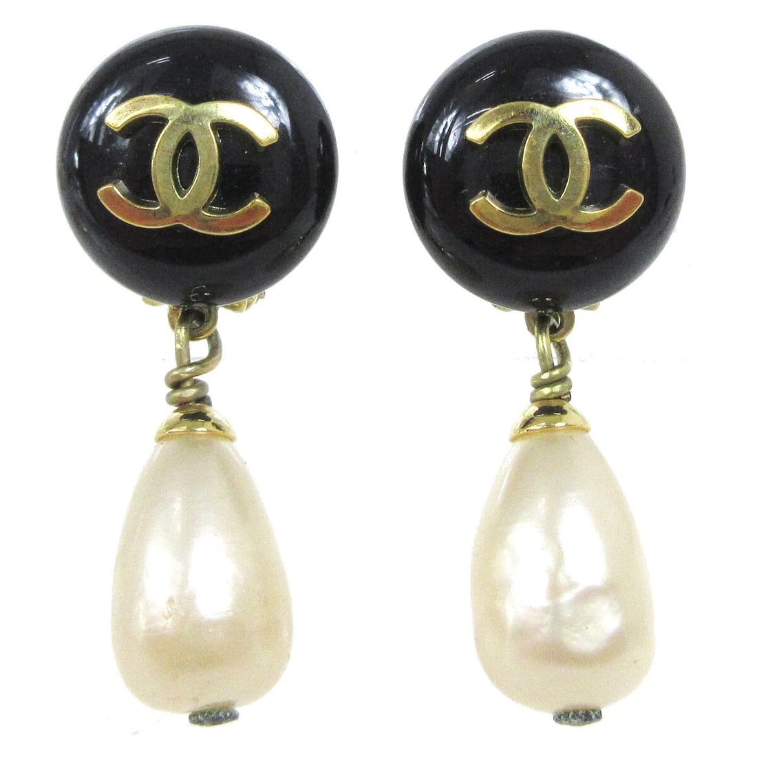 CHANEL ARTIFICIAL PEARL DANGLE EARRINGS: Chanel Artificial Pearl Dangle Earrings Brand: CHANEL Type/Style: Earrings Material: Gold-tone Plastic, Main Stone/Creation Artificial Pearl Color: Gold, Black, White Size: W 1.5 x H 3.8 cm Access