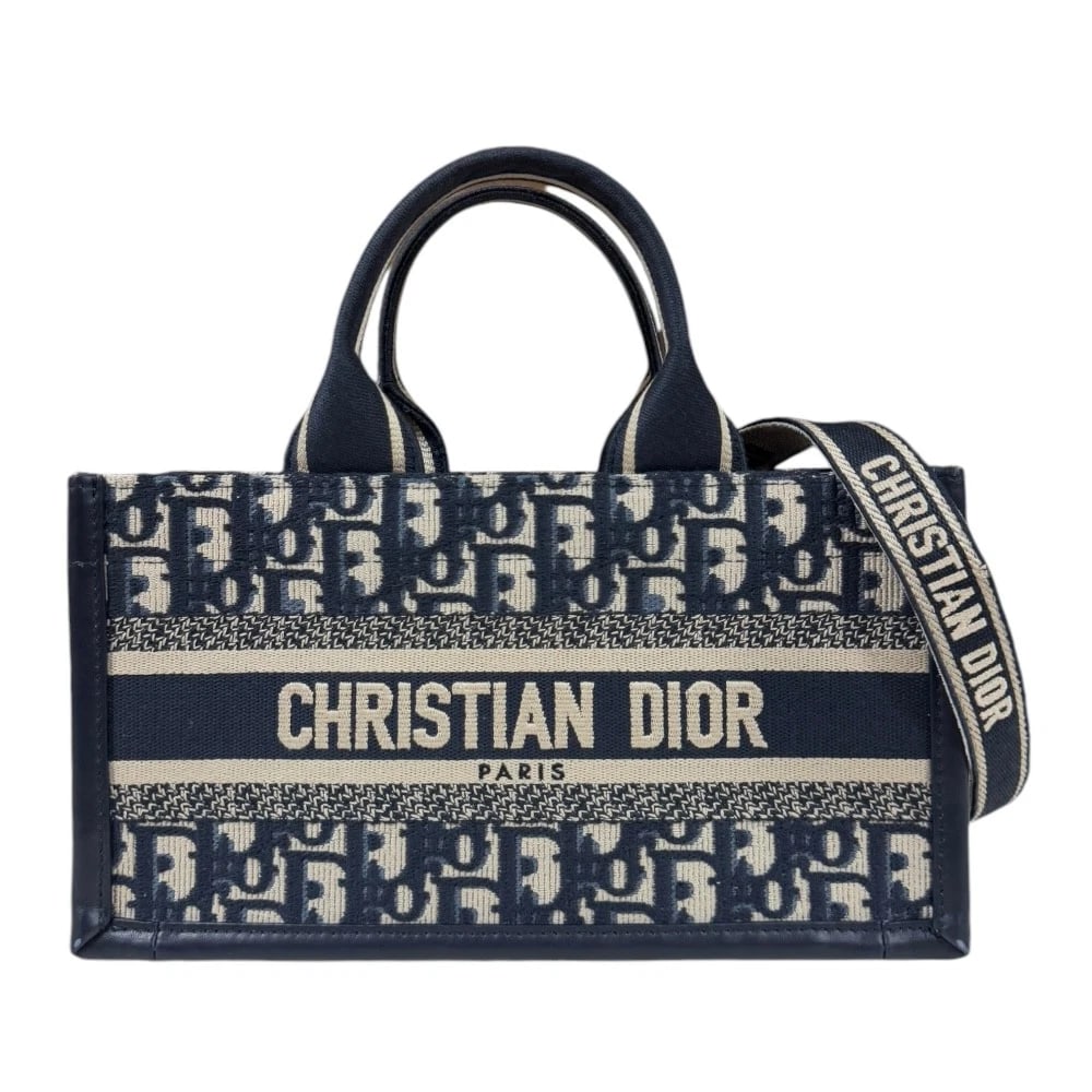 DIOR SHOULDER BAG CANVAS LEATHER 2WAY: Dior Shoulder Bag canvas leather 2WAY Brand: Dior Type/Style: Shoulder Bag Material: Exterior Material canvas Color: Exterior Color Navy Size: W10.6 x H5.9 x D3.5inch Handle:9.8inch Accessories: None