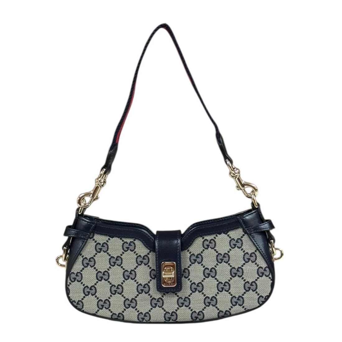 GUCCI SHOULDER BAG GG CANVAS MOONSIDE: GUCCI Shoulder Bag GG canvas Moonside Brand: GUCCI Type/Style: Shoulder Bag Material: Exterior Material GG canvas Color: Exterior Color Navy / beige Size: W9.1 x H3.9 x D1.8inch Accessories: None